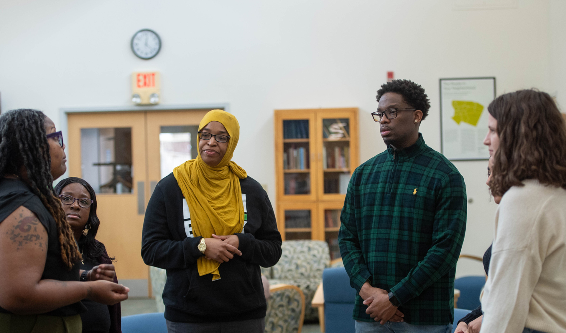 Group of diverse social work students on campus talking